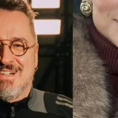 Piotr Kędzierski z żoną, uśmiechnięty mężczyzna w okularach i fragment twarzy kobiety w futrze.