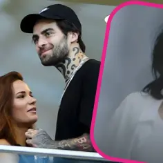Natalia Szroeder i Quebo, para artystów, uśmiechnięci obok siebie. W tle ujęcie Natalii z teledysku.