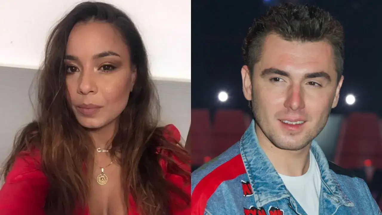 Kamil Bednarek i jego żona, uśmiechnięci, patrzą w różne strony.